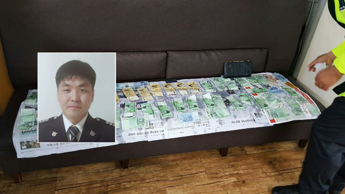 태풍에 흩날리던 <em class='find'>현금</em> 86만원 주워 돌려준 경찰